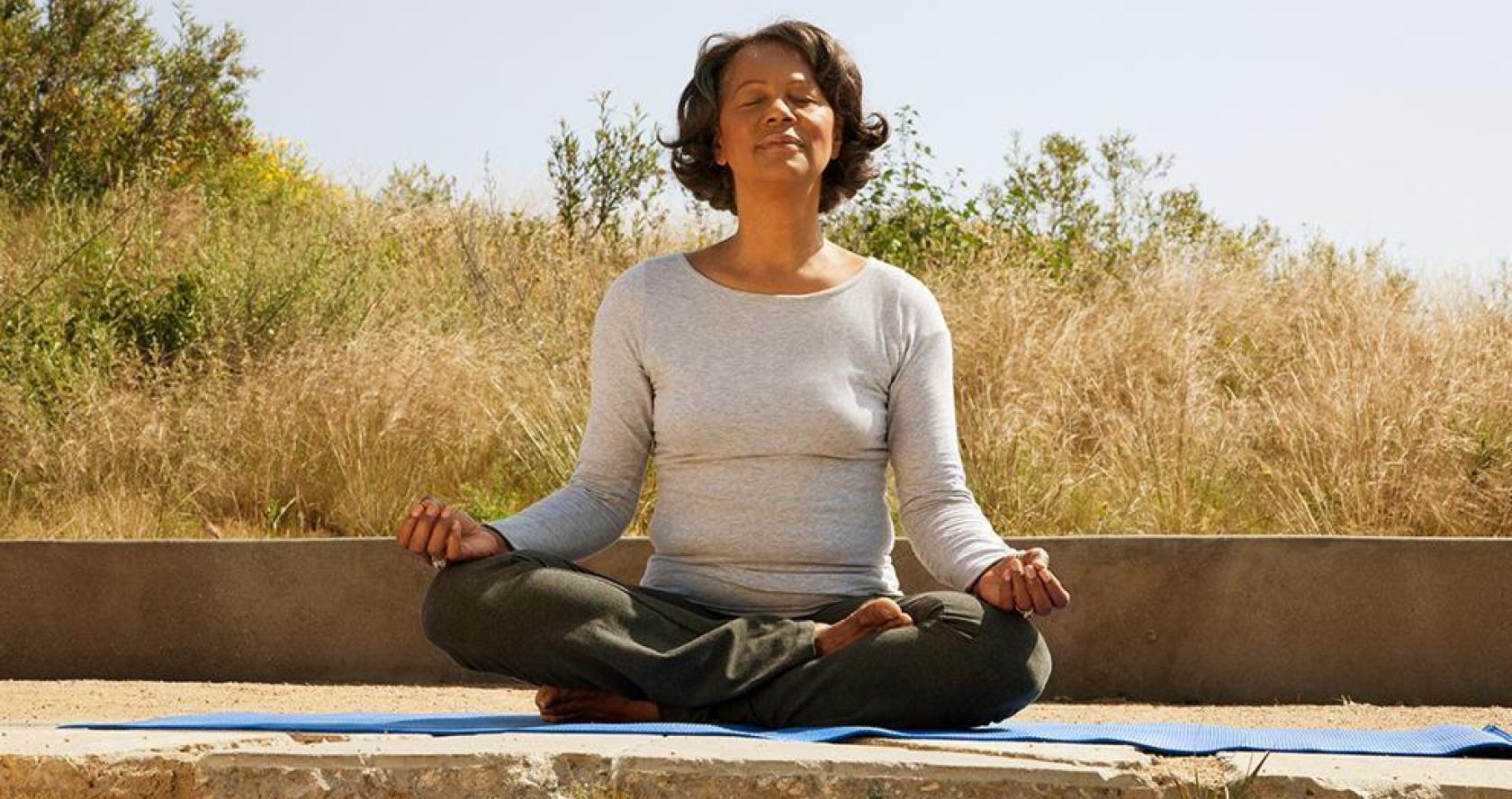 Оlder woman meditating