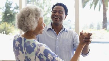 Man and older woman dancing